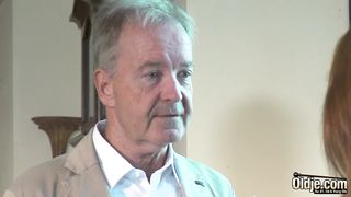 Lusty red haired honey is fellating an old man's manmeat to pay some of the family's debts